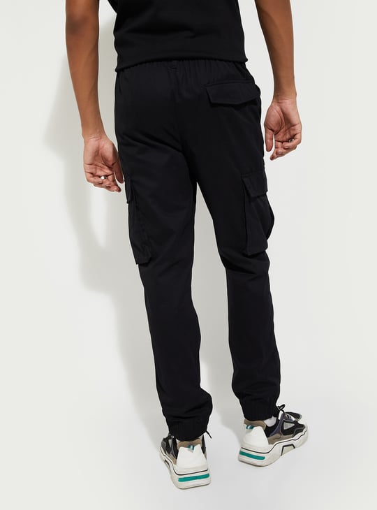 Buy URB_N Solid Cargo Trousers Online at just Rs. 999.0