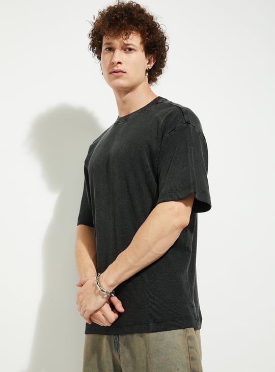 Buy URB_N Men Textured Oversized T-shirt Online at just Rs. 799.0