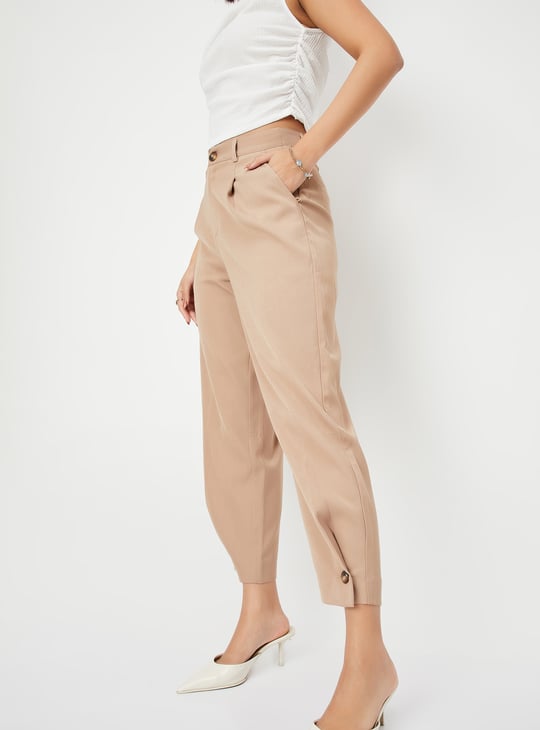 Women Solid Carrot Fit Trousers