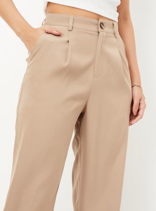 Women Solid Carrot Fit Trousers
