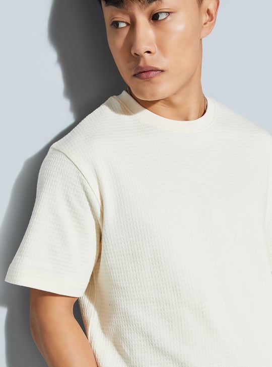 Buy URB_N Men Textured T-shirt Online at just Rs. 699.0