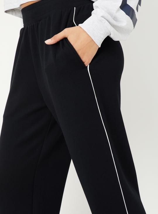 Buy Women Side Taped Butter Soft Track Pants Online at just