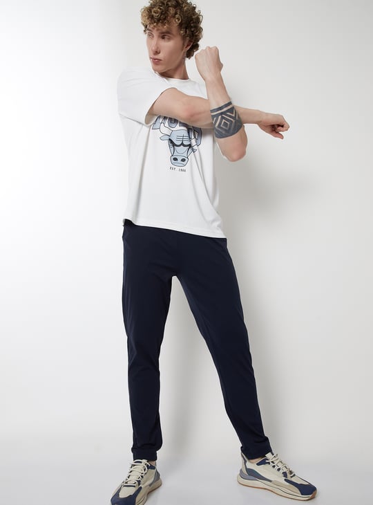 Men Solid Slim Fit Track Pants