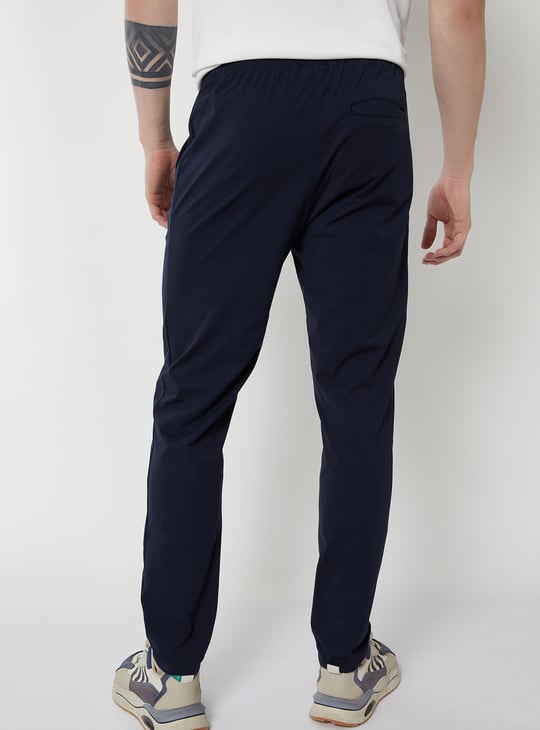 Men Solid Slim Fit Track Pants