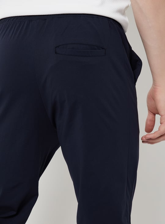 Men Solid Slim Fit Track Pants