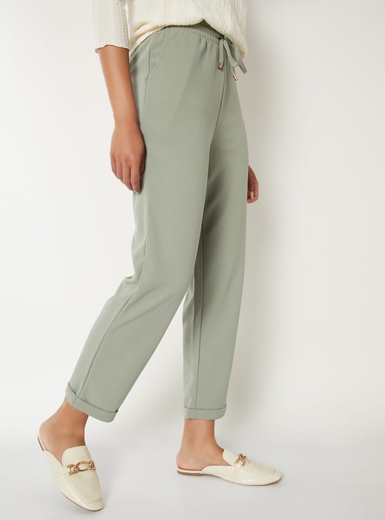 Buy Women Textured Trousers Online at just Rs. 999.0