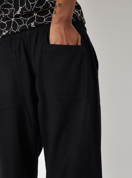Women Textured Peg Trousers