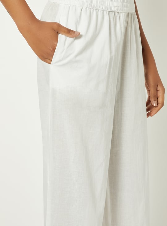 Women Embroidered Palazzos with Scalloped Hem