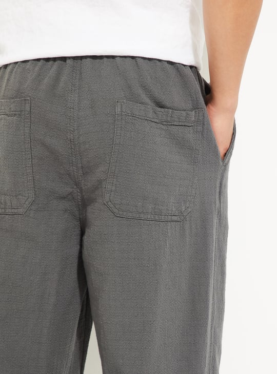 Men Solid Woven Pull-On Pants