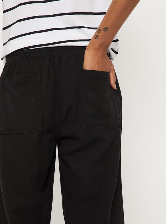 Women Solid Ankle Length Trousers