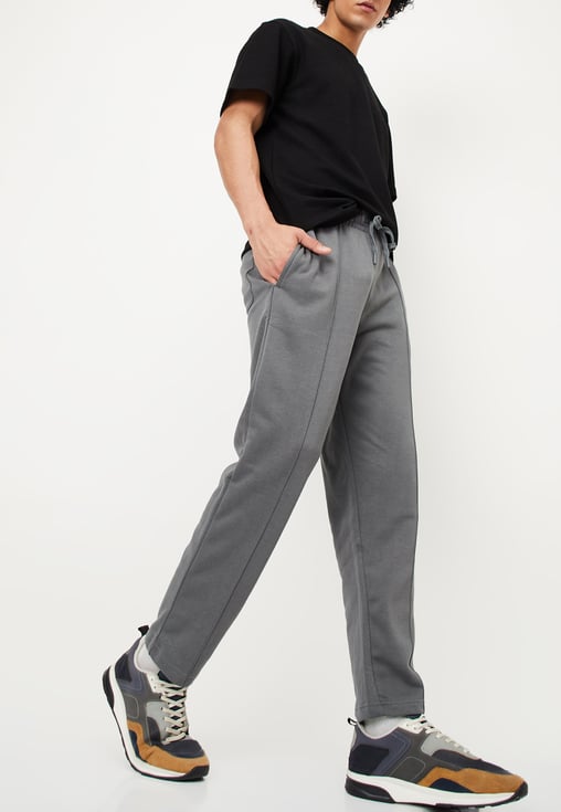 Buy Men Solid Track Pants Online at just Rs. 999.0 - 1000014742007