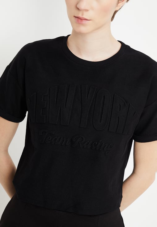 Buy Women Embossed Athleisure T-shirt Online at just Rs