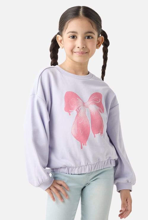 Juniors Bow Print Pullover with Long Sleeves
