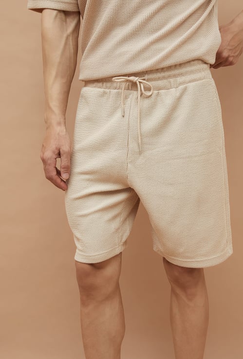 CODE UNWIND Textured Knit Shorts