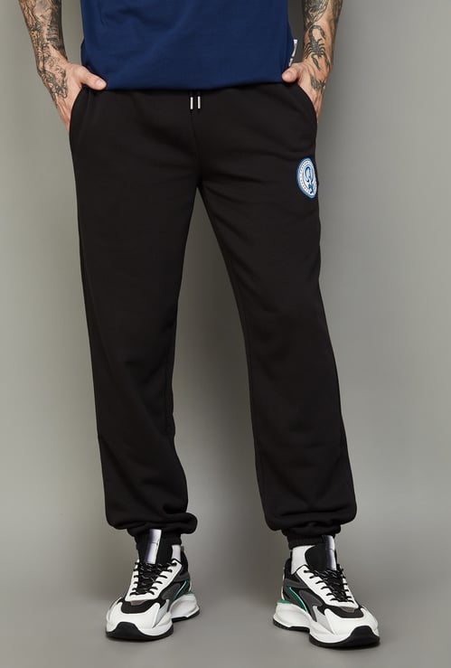 PUMA Essentials Brand Print Joggers
