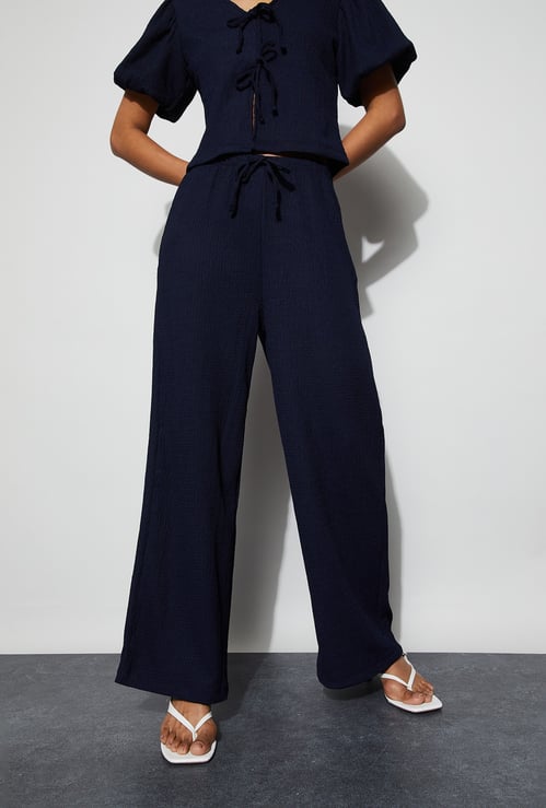 GINGER Textured Wide Leg Trousers