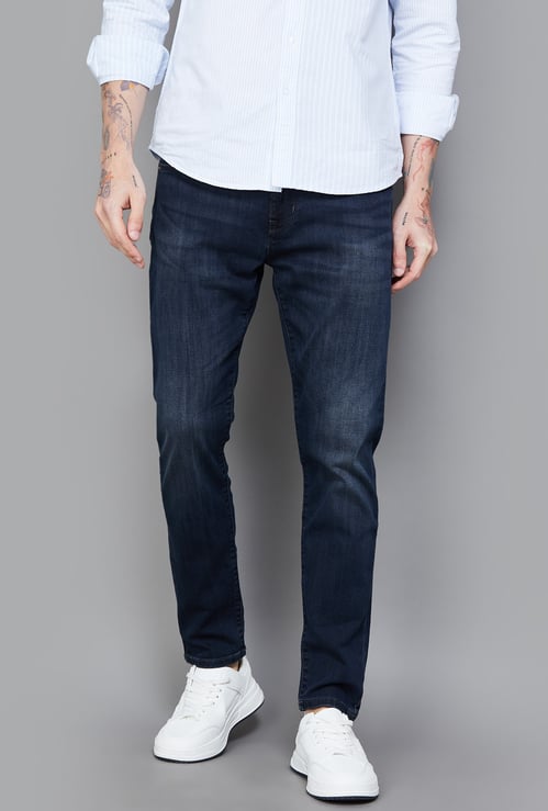 FLYING MACHINE Solid Dark Wash Slash Jeans (Slim Tapered)