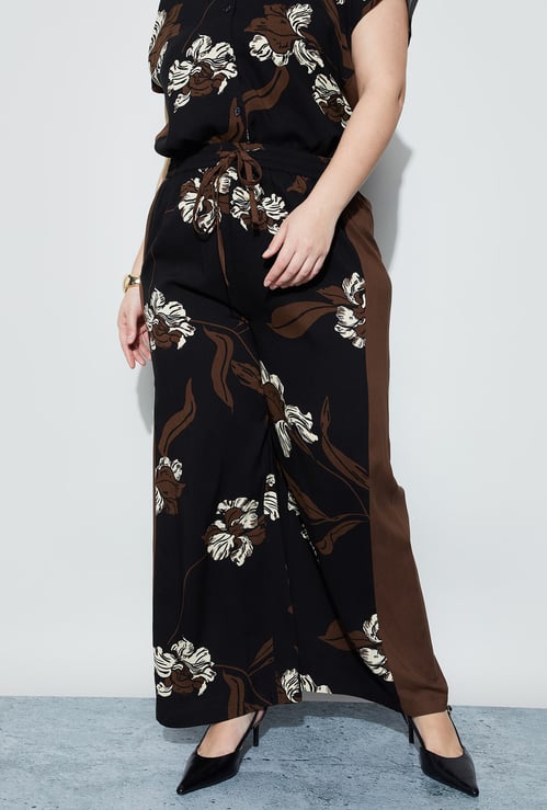 NEXUS Floral Print Trousers