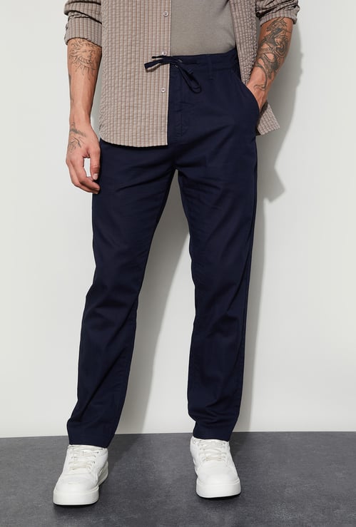 CODE UNWIND Solid Regular Fit Trousers