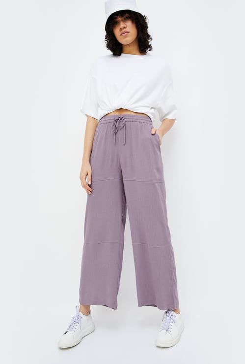 GINGER Women Solid Elasticated Flared Trousers