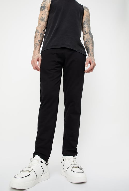 Men Solid Slim Fit Track Pants 