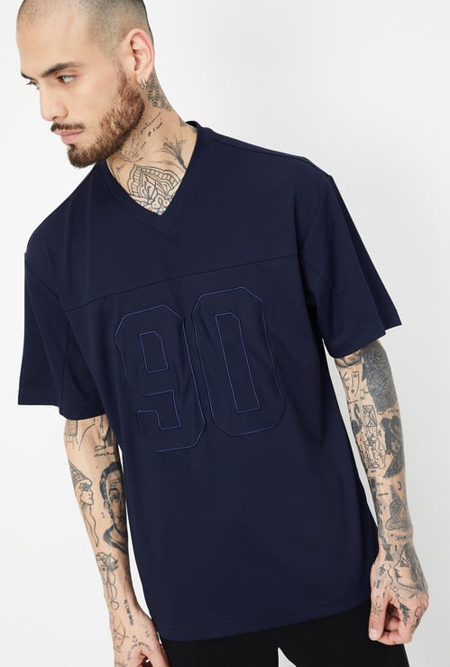 Men Textured Oversized Sports T-shirt