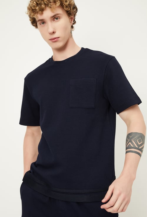 Men Textured Oversized Sports T-shirt