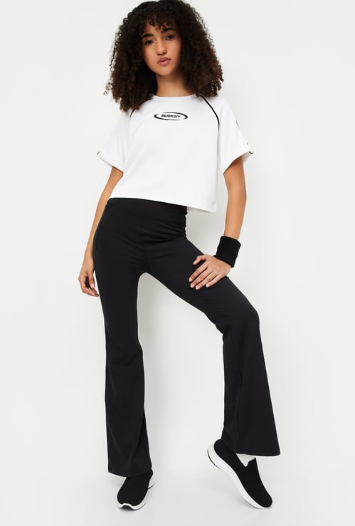 Women Solid Flared Sports Track Pants