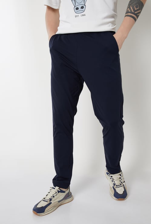 Men Solid Slim Fit Track Pants