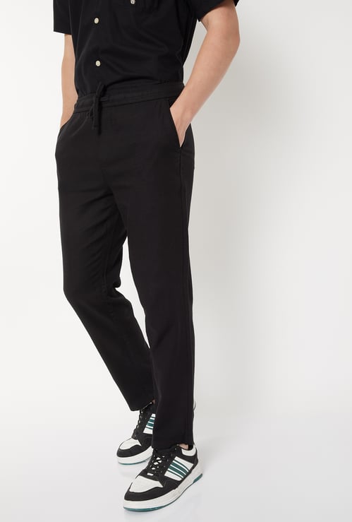 Men Textured Slim Fit Trousers