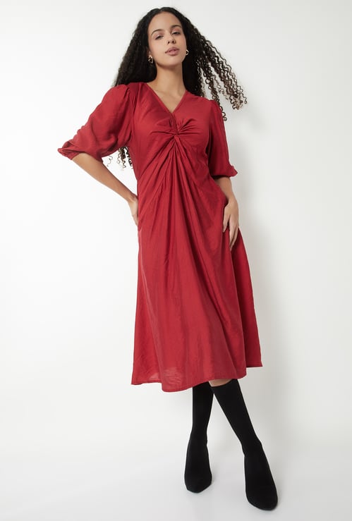 Women Solid Twisted A-line Midi Dress