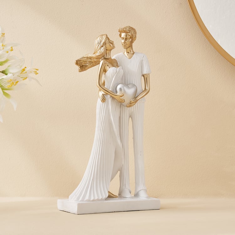 Corsica Polyresin Couple with Heart Figurine