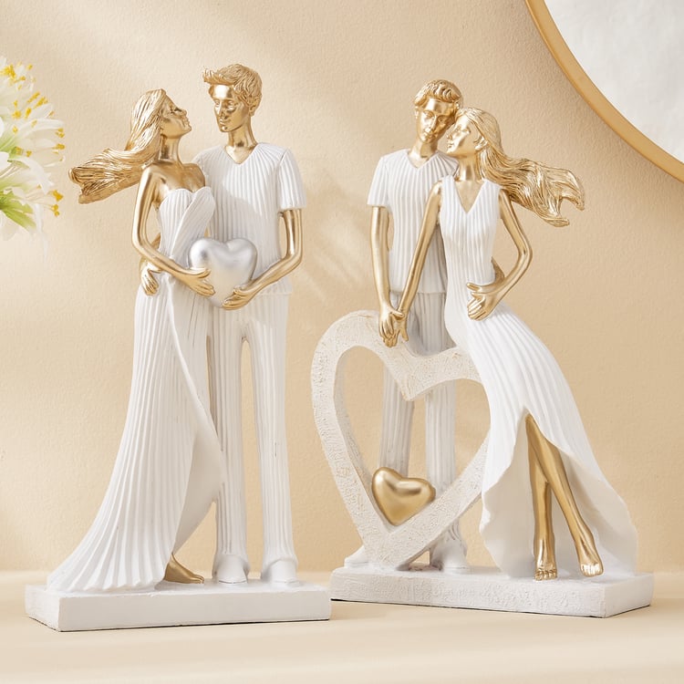 Corsica Polyresin Couple with Heart Figurine