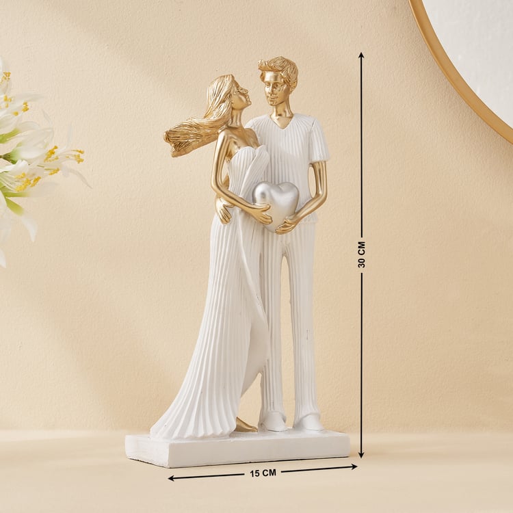 Corsica Polyresin Couple with Heart Figurine