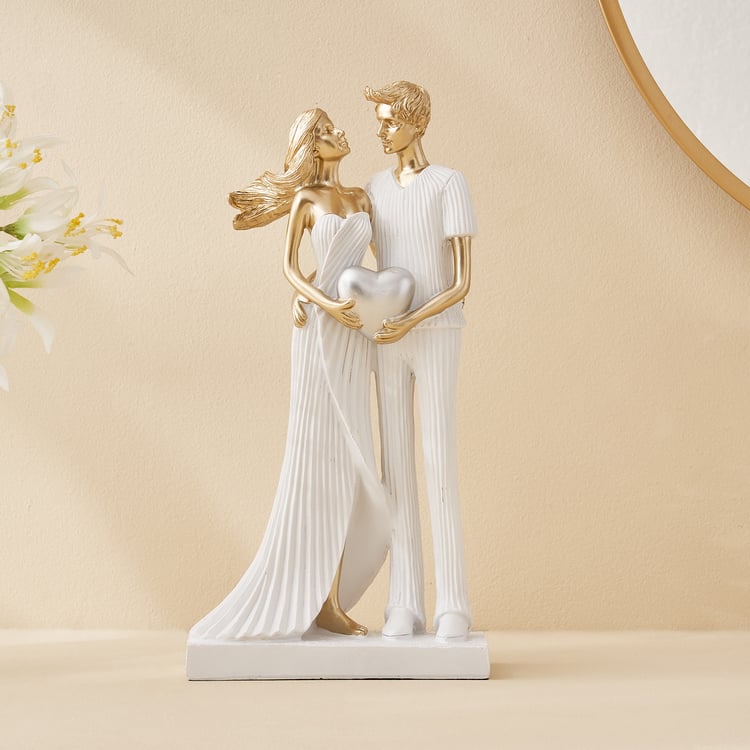 Corsica Polyresin Couple with Heart Figurine