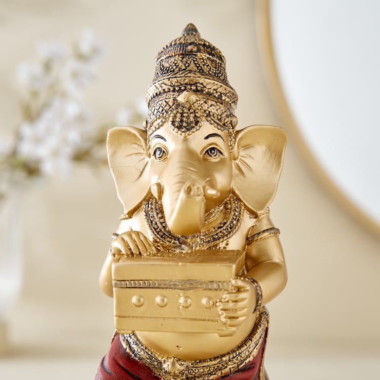 Alpana Fiesta Polyresin Ganesha with Harmonium Figurine