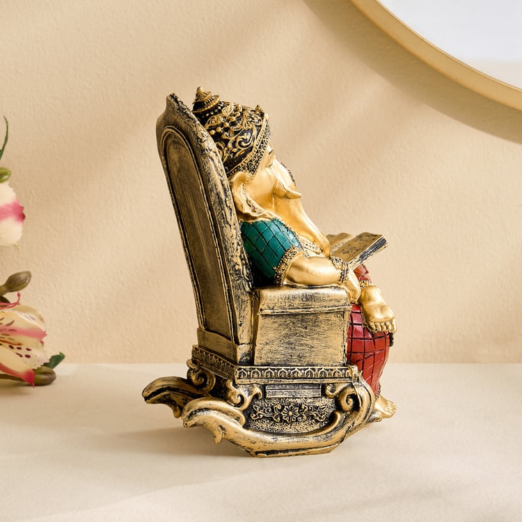 Alpana Ojas Polyresin Ganesha on Rocking Chair Figurine