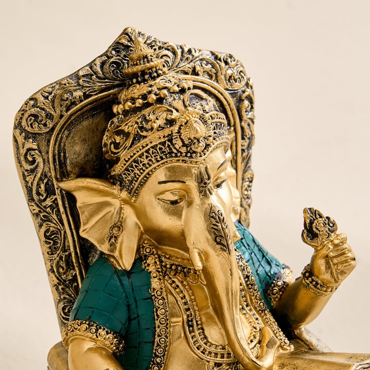 Alpana Ojas Polyresin Ganesha on Rocking Chair Figurine