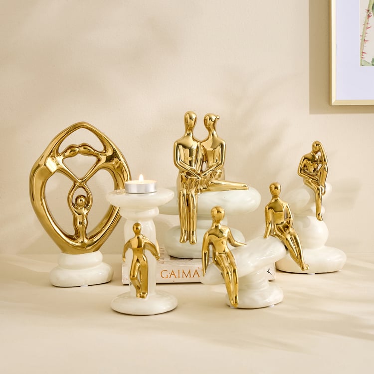 Brighton Amias Ceramic Human Sitting on Rock Figurine