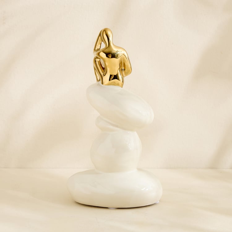 Brighton Amias Ceramic Human Sitting on Rock Figurine