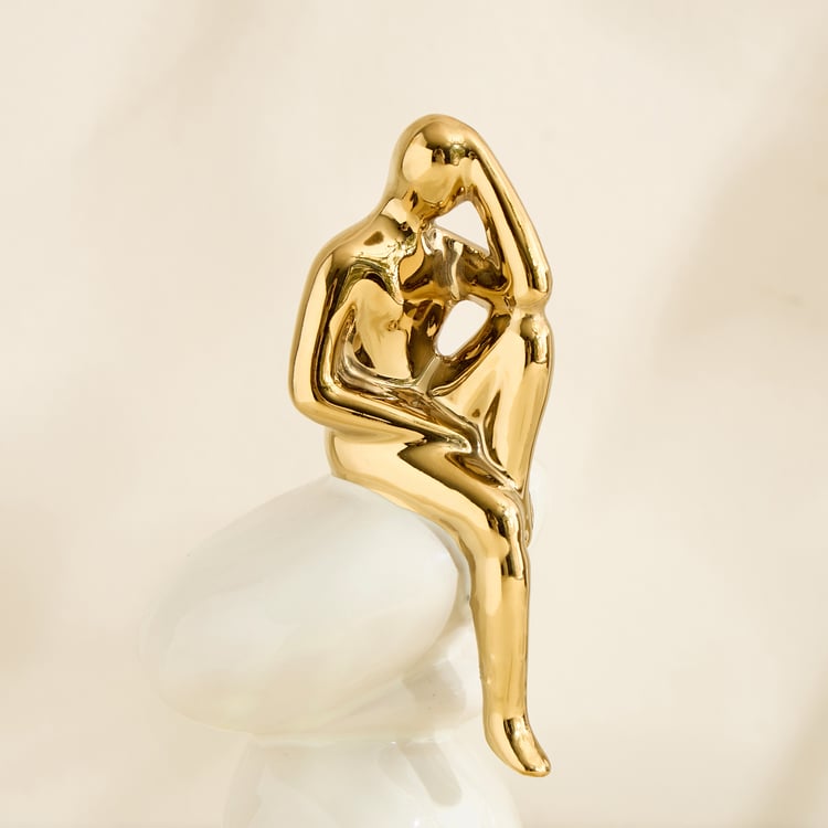 Brighton Amias Ceramic Human Sitting on Rock Figurine