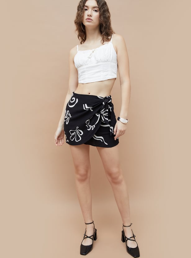 Buy GINGER Woven Design Crop Spaghetti Top from Ginger at just INR