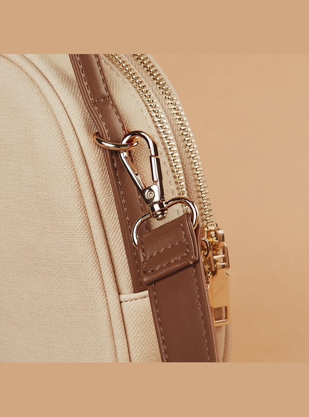 GINGER Textured Sling Bag
