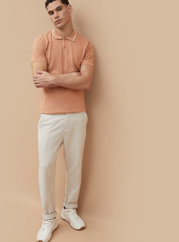 Buy CODE Knitted Polo T-shirt from CODE at just INR 1499.0