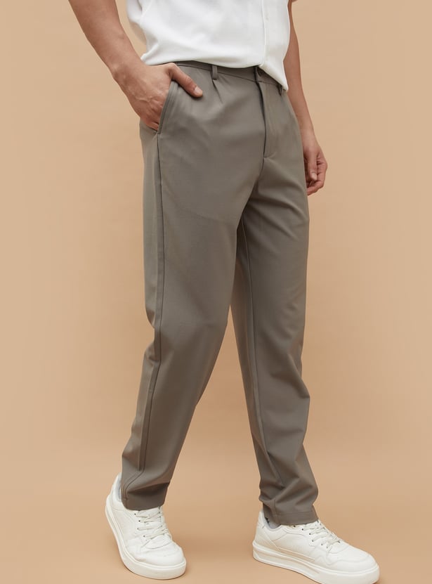 Buy CODE Solid Regular Fit Trousers from CODE at just INR 1999.0