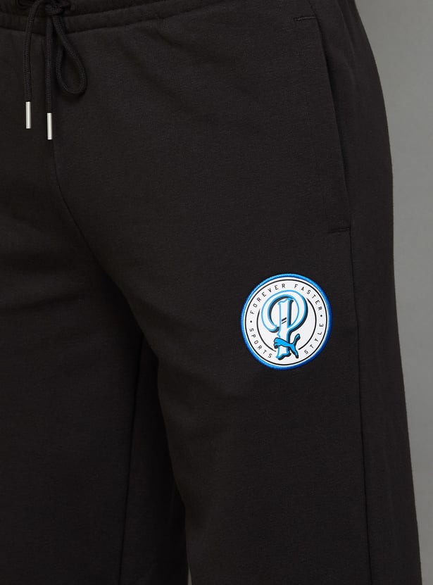 PUMA Essentials Brand Print Joggers