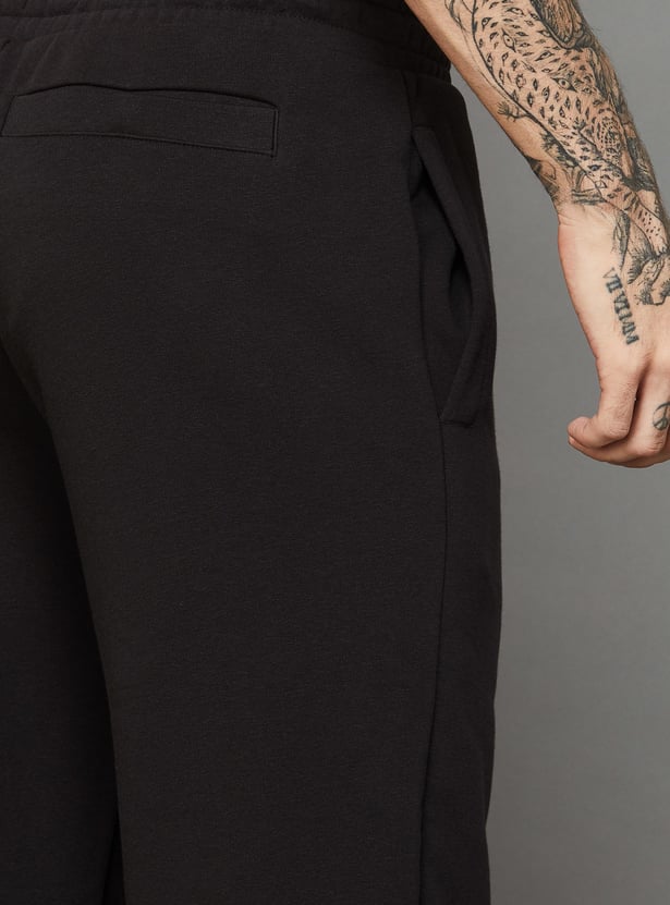PUMA Essentials Brand Print Joggers