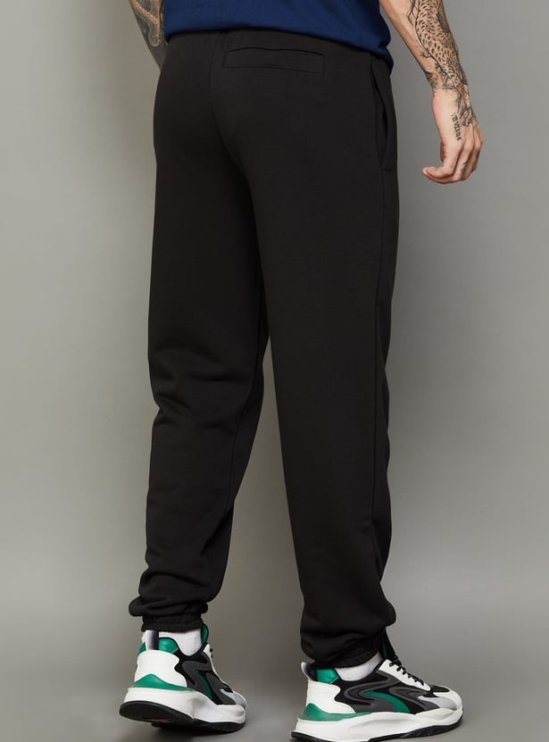 PUMA Essentials Brand Print Joggers