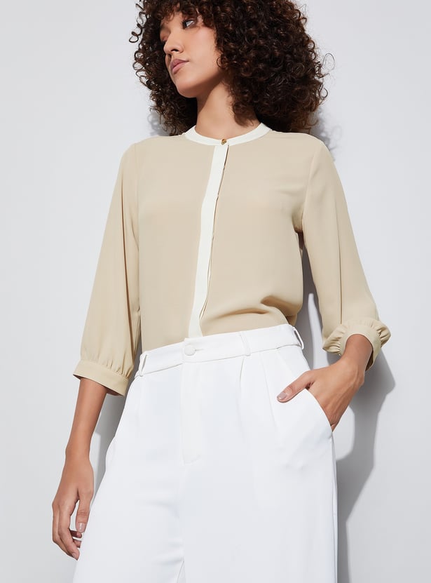 Buy CODE CLASSIC Solid Buttoned Top from Code Classic at just INR 1699.0
