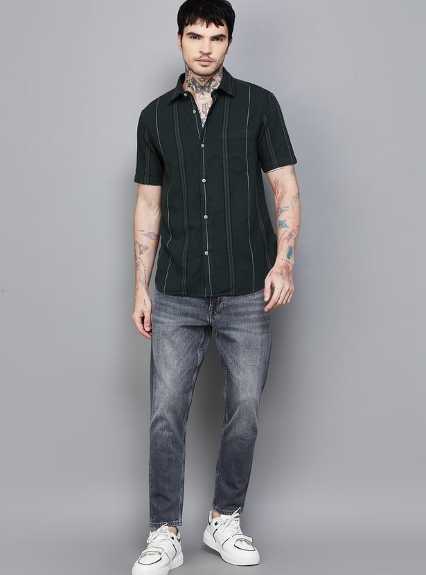 FLYING MACHINE Washed Mankle Jeans (Slim Tapered)